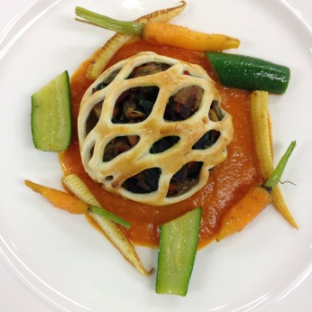 Globe Artichoke Stuffed with Wild Mushrooms and Spinach in Puff Pastry, Tomato Sauce with Basil